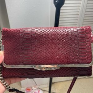 Nine West Maroon snake pattern clutch